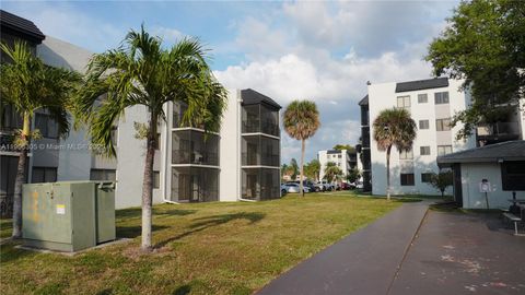 Photo of 3710 N Pine Island Rd #320, Sunrise, FL 33351 (MLS # A11905305)