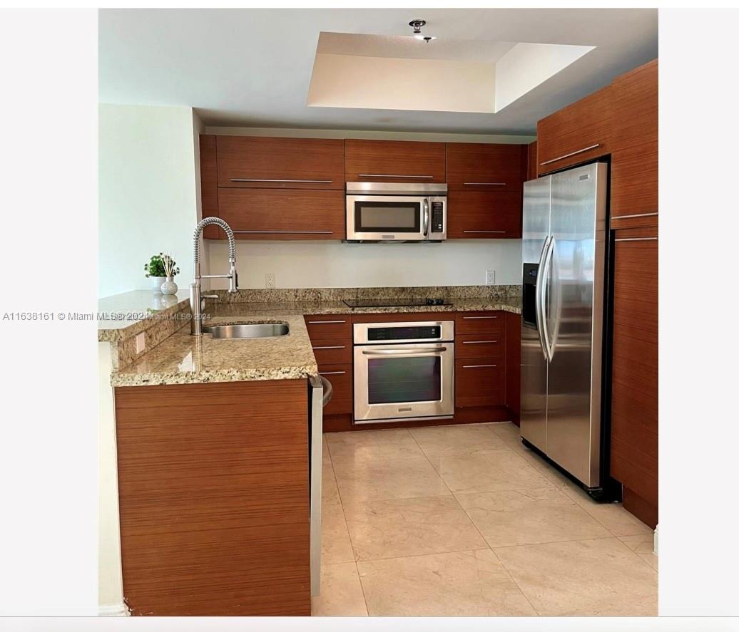 TAO SAWGRASS CONDOMINIUM - Residential Lease