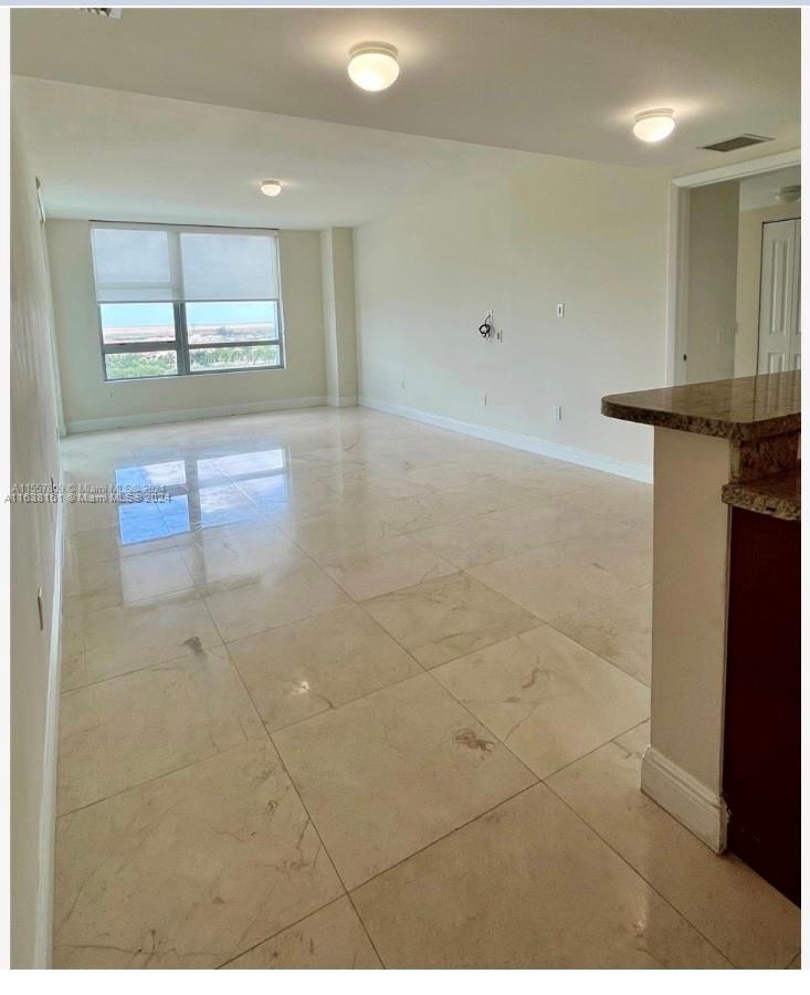 TAO SAWGRASS CONDOMINIUM - Residential Lease