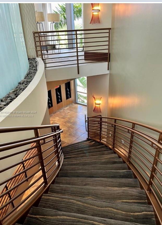 TAO SAWGRASS CONDOMINIUM - Residential Lease