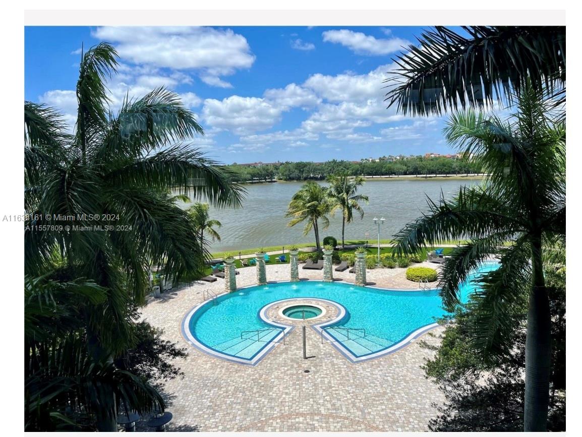 SPECTACULAR LAKE VIEW, POOL AND EVERGLADES, ENJOY RESORT LIFESTYLE IN THE LUXURY TAO CONDO, 2 BEDROOMS 2 BATHS, EUROPEAN KITCHEN, GRANITE COUNTERTOPS, STAINLESS STEEL APPLIANCES, CUSTOM-MADE CLOSETS AND DESKS, MARBLE FLOORS, SHADES, 2 PARKING SPACES CLOSE TO ELEVATOR, SPA, GYM, POOL, TENNIS, WASHER, DRYER, AND THE BIGGEST STORAGE ROOM IN THE WHOLE BUILDING, DON'T MISS THIS ONE.