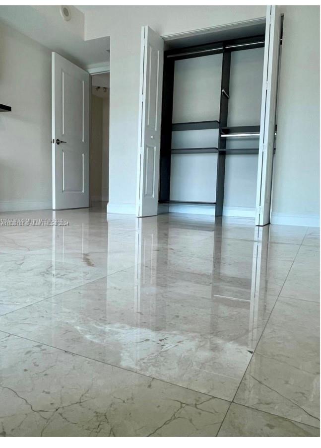 TAO SAWGRASS CONDOMINIUM - Residential Lease