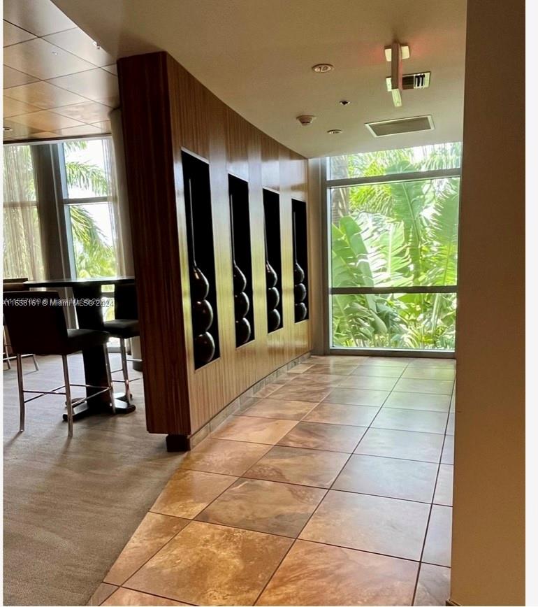 TAO SAWGRASS CONDOMINIUM - Residential Lease