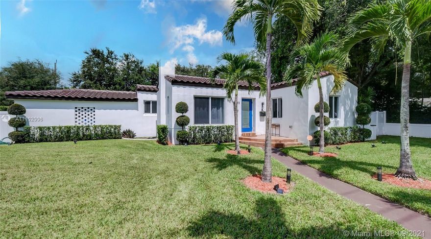 Welcome to The Santorini Sol of Miami Shores. Minutes from Downtown Miami Shores, this fully updated sun-drenched mid-century Mediterranean oasis sits on a desirable double-wide, private lot featuring a large entertainment deck and lush landscaping. The bright, open-concept great room anchored by a honeycomb stoned fireplace flows into the updated kitchen and dining area equipped with smart appliances and designer finishes. The relaxing media room features flex-space perfect for an office, den or formal dining. Retire to your oversized suite separate from main living areas and guestrooms for ultimate privacy, which features a beautiful shower and large walk-in closet. Home complete with smart lights/lock, spacious bedrooms, impact doors-windows, new roof/electrical/plumbing/remote gate.