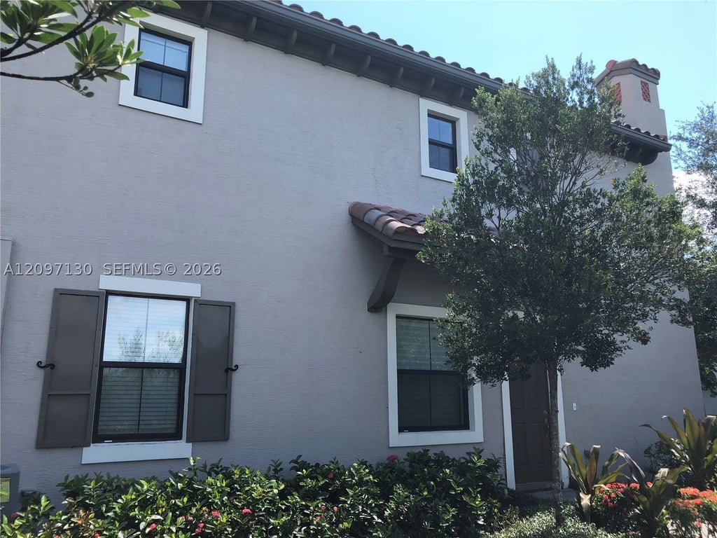 Photo of 3381 NW 125th Ln #3381, Sunrise, FL 33323 (MLS # A12097130)