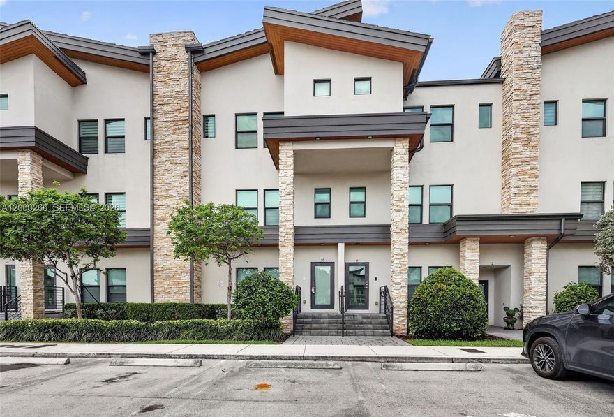 Modern split-level contemporary townhome in the highly sought-after Highland at Park Central. This beautifully upgraded 3-bedroom, 2.5-bath residence features a unique split-level design with all bedrooms located upstairs, offering privacy and comfort with generously sized rooms. The home showcases a bright, open-concept layout with porcelain flooring throughout, impact glass, quartz countertops, stainless steel appliances, and sleek, modern finishes. Spacious living and dining areas flow effortlessly, creating the perfect setting for both everyday living and entertaining. Additional highlights include a private balcony, in-unit washer and dryer, and extra storage space for added convenience. Enjoy resort-style living with an exceptional collection of amenities, including a swimming pool with sun deck, fitness center, sauna, billiard room, tennis and basketball courts, soccer field, children’s water park, playground, and more. Ideally located near shopping, dining, and major highways, this home offers the perfect blend of style, comfort, and lifestyle.