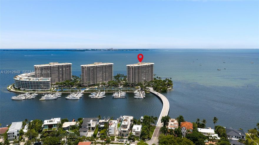 Welcome to Residence A1809 at 1 Grove Isle, a completely renovated 3-bedroom, 2.5-bathroom home in the sky spanning 2,614 square feet and offering breathtaking panoramic views in every direction. From sunrise over Biscayne Bay to the sparkling skyline of Downtown Miami, with sweeping vistas of Coral Gables and Coconut Grove, every room captures a stunning perspective.  Thoughtfully redesigned with modern elegance, the residence features top-of-the-line Sub-Zero and Miele appliances, including a double wall Miele oven, paneled Sub-Zero refrigerator doors, and a wine refrigerator—perfectly suited for both everyday living and entertaining.  Sleek finishes and a seamless blend of style and comfort define the interiors, complemented by motorized shades and a beautifully executed, well-designed California Closets system for optimal organization.  Set within a private, guard-gated island community with 24-hour security, this is resort-style living at its finest—where every day feels like a vacation. Don’t miss the opportunity to call this exceptional residence home.