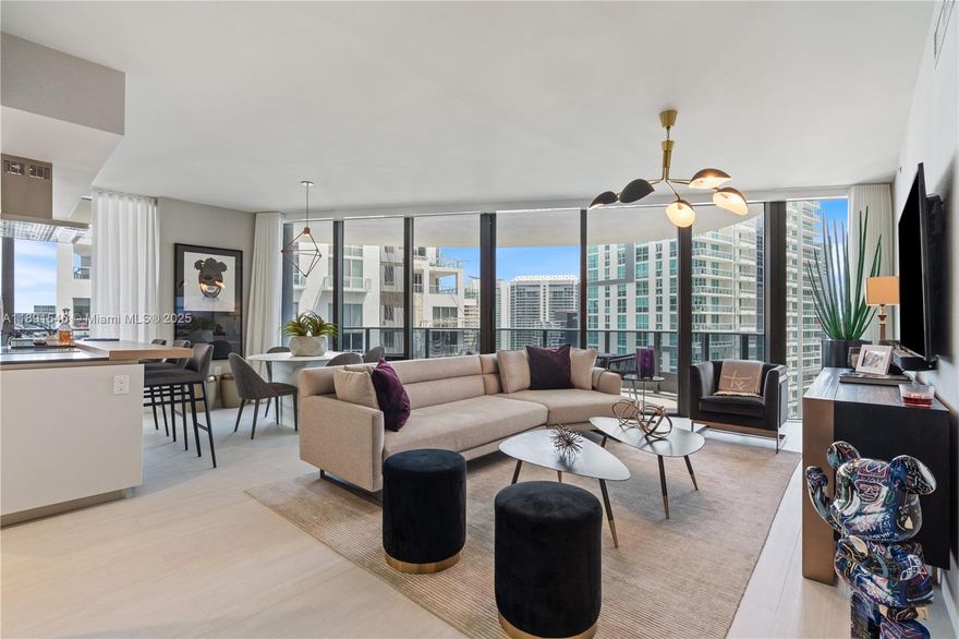 Live at the newest & most luxurious building with the highest quality and in the best location in Downtown Brickell. This 2 bedrooms and 2 baths with 1/2 bath on the 35th floor at the brand new ultra-luxurious Brickell Flatiron Condo. This unit is the 01 line; the most coveted line in the tower. With 9' ceilings and floor to ceiling glass, breathtaking views south, east, north, and west. The colorful city lights, Biscayne Bay, and views as far as Coconut Grove are yours to enjoy. Amenities include 2 Pools,2 Jacuzzis, State of the Art Fitness Center, Spa with Steam, Sauna and massage & spectacular views from the 64th level amenity floor.2 Lounges, Theatre room, billiard room, and Children room. New electric shades and brand new closets installed.
