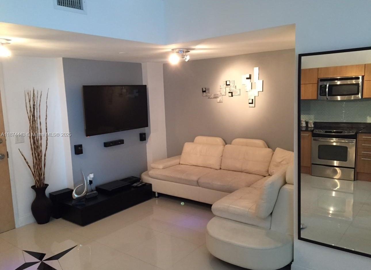 A bright, spacious, modern 1/1 in The Wind, ideally situated in the heart of Brickell. This unit comes fully furnished with stylish, high-quality pieces and all essentials for immediate move-in. Enjoy a spacious open living area, a well-equipped kitchen, and flexible den space that can function as a home office, guest room, or lounge area. The building offers contemporary amenities and a walkable Brickell lifestyle, putting you minutes from dining, nightlife, and shopping.