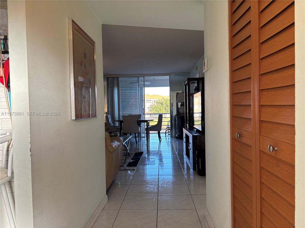 Photo of 9900 Sunrise Lakes Blvd #210, Sunrise, FL 33322 (MLS # A11973991)