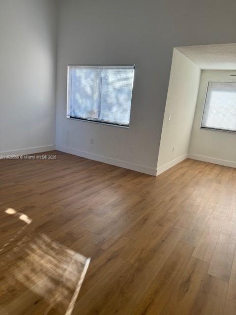 Centrally located in the Fontainebleau area, walking distance from large shopping center, minutes from the Florida Turnpike and 836. This 3BR/2BA two-story condo, with fenced front patio entry, offers 1,130 sq ft of living space with hurricane impact windows and laminated flooring throughout. Kitchens appliances are 1 year old, stackable washer/dryer. This condo is move-in ready! Enjoy the convenience of assigned parking close by unit entrance. Community amenities include pool, tennis court, and there is a serene public park within walking distance. The association maintenance fee further includes water & sewer, trash service, exterior parking, landscaping, and amenities.