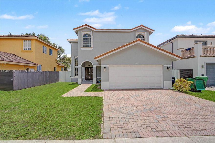 Fantastic, light and bright, 4-bedroom 3 bath, 2 story home built in 2007. Lovely formal foyer entry with double doors. Open formal living and dining room with volume ceilings. Modern Porcelain flooring. Welcoming, cozy kitchen complete with breakfast nook, features counter seating and pantry, and opens to the family room. 1 guest bedroom and full bath located downstairs. Upstairs you will find 3 additional bedrooms including the primary suite complete with walk-in closets and primary bath with dual sinks, separate shower and soaking tub. Indoor laundry room. Accordion hurricane shutters. Low maintenance, fenced yard. 2 car garage.