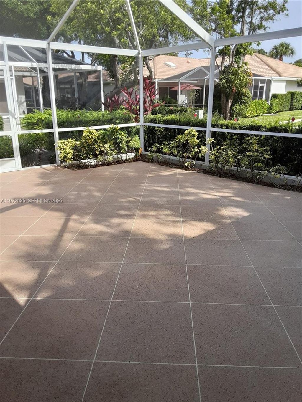 Photo of 1601 Silverleaf Oak Ct #1601, Palm Beach Gardens, FL 33410 (MLS # A11972035)