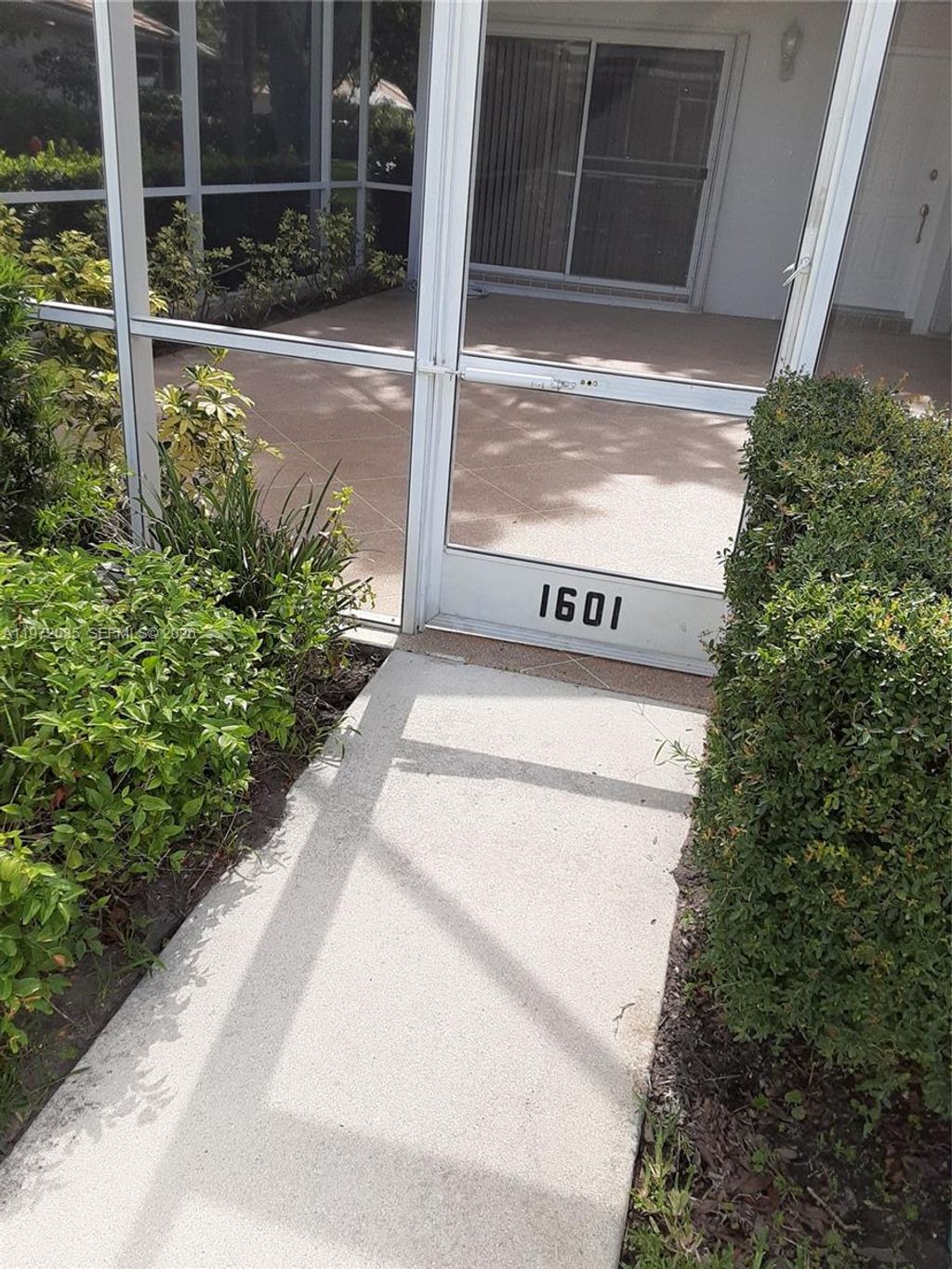 Photo of 1601 Silverleaf Oak Ct #1601, Palm Beach Gardens, FL 33410 (MLS # A11972035)