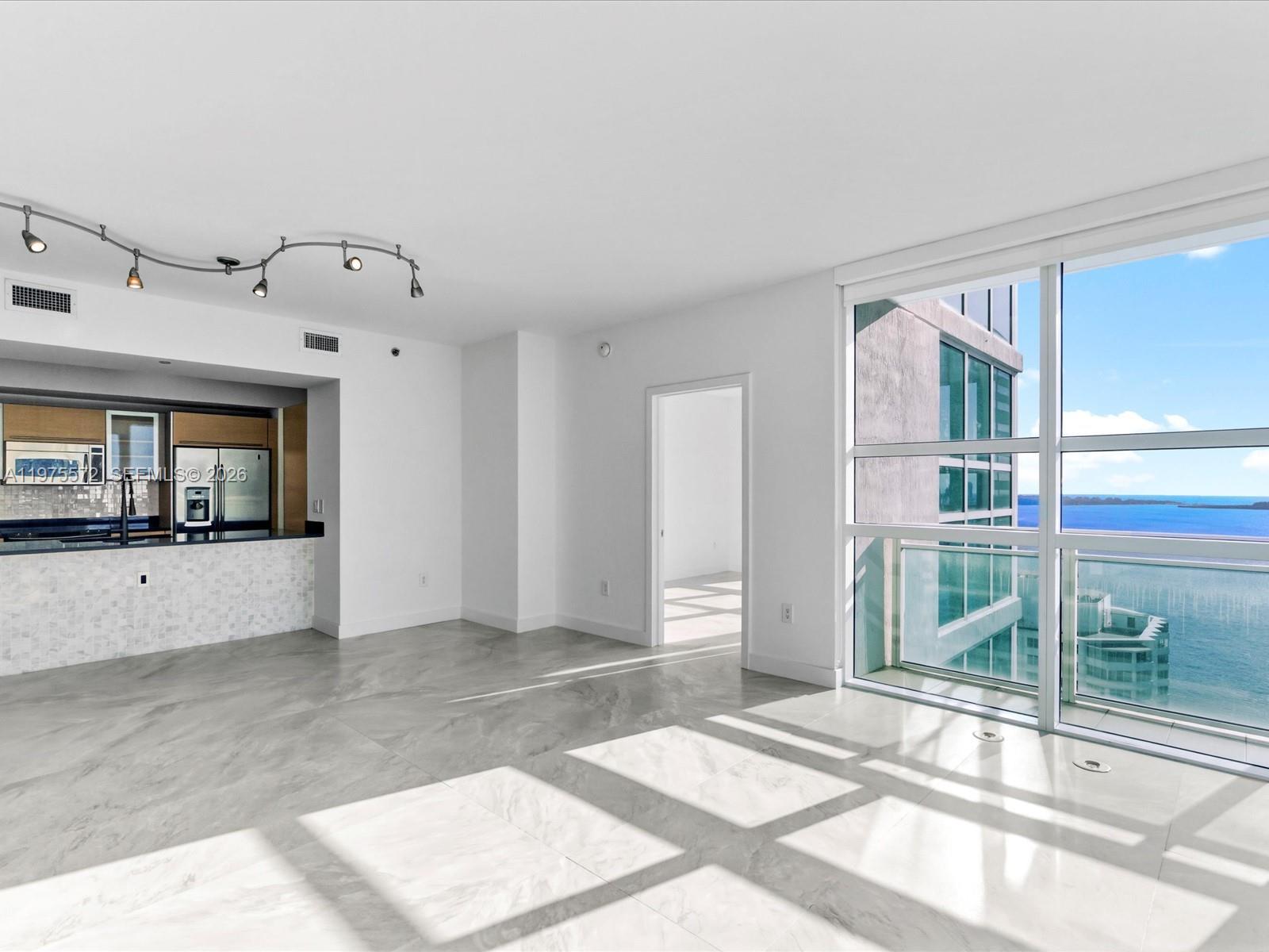 THE PLAZA 901 BRICKELL CO - Residential Lease