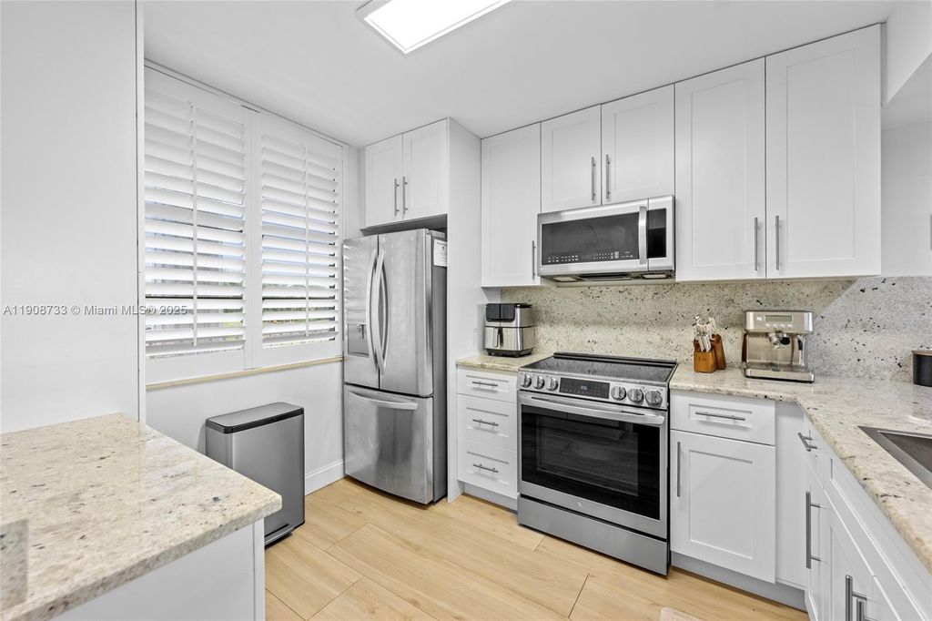 Photo of 1532 Whitehall Dr #304, Davie, FL 33324 (MLS # A11908733)