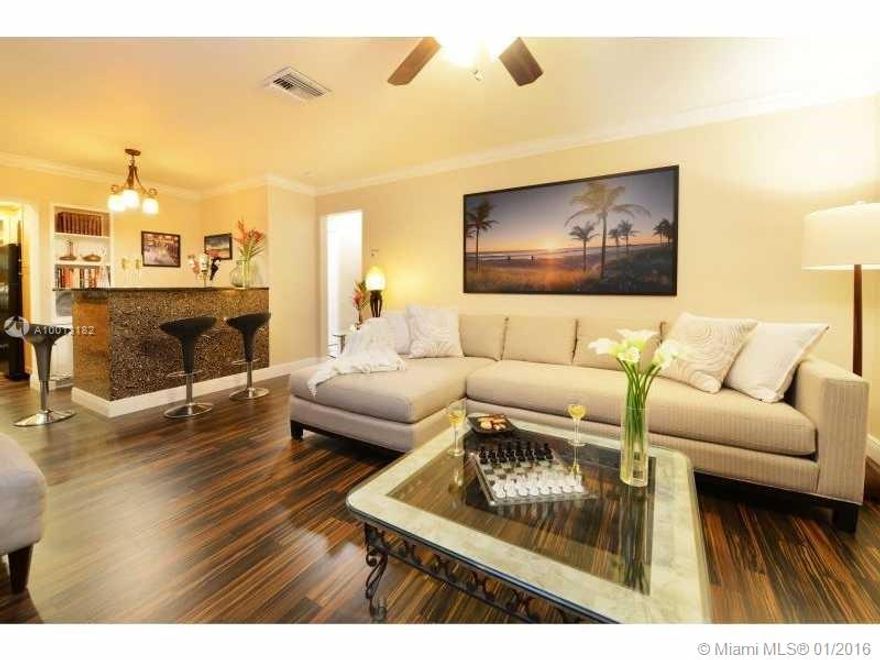 Lauderdale-by-the-Sea tranquility just a 3 minute walk from the Beach. Enjoy this tastefully furnished 2 bedroom, 2 bath apartment situated ideally between Downtown LBTS shops & markets, all a short walk away. Serenity comes standard in the private hot-tub equipped tropical back yard exclusively for you. Spacious new kitchen w/marble counter tops is fully equipped or fire up your grill. The apartment has many upgrades & is turn-key move in ready, 2 parking spots. This is the one you have been waiting for!