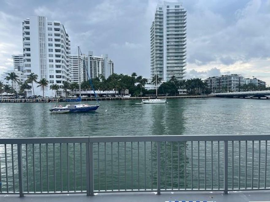 LOCATION! LOCATION! LOCATION! This building is on the water!  Enjoy a relaxing amazing water view from your very own pool area!!!! Spacious apartment with all tiled floors throughout in good condition.  Large balcony facing street. Spacious bedroom and walk in closet.  Secured building with laundry facilities, bike storage area, and one assigned parking place.