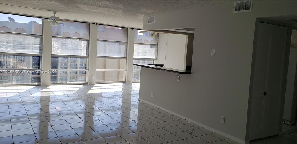 Photo of 851 Three Islands Blvd #502, Hallandale Beach, FL 33009 (MLS # A12010895)