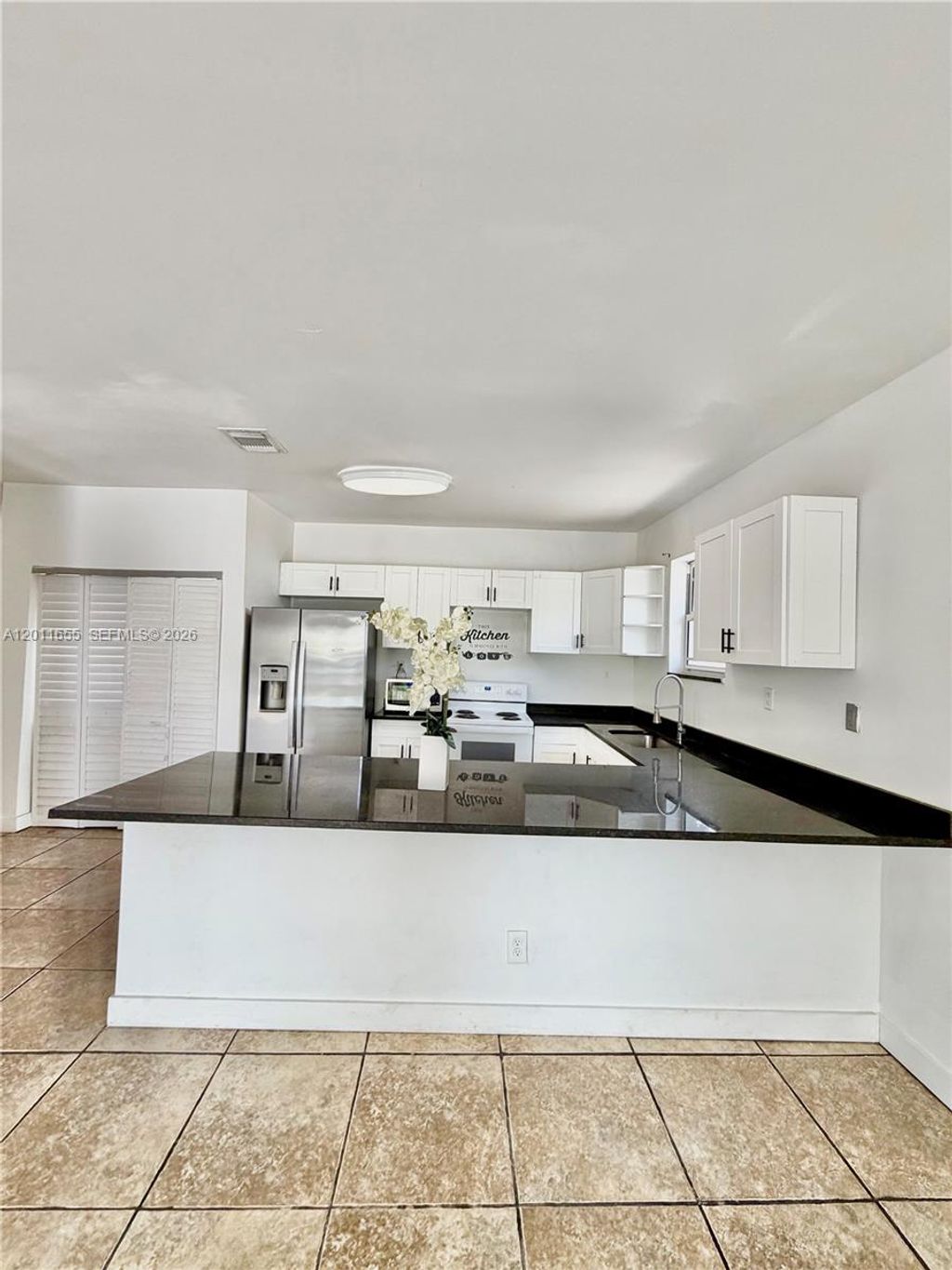 Photo of 1201 NE 6th Ave #1201, Fort Lauderdale, FL 33304 (MLS # A12011655)
