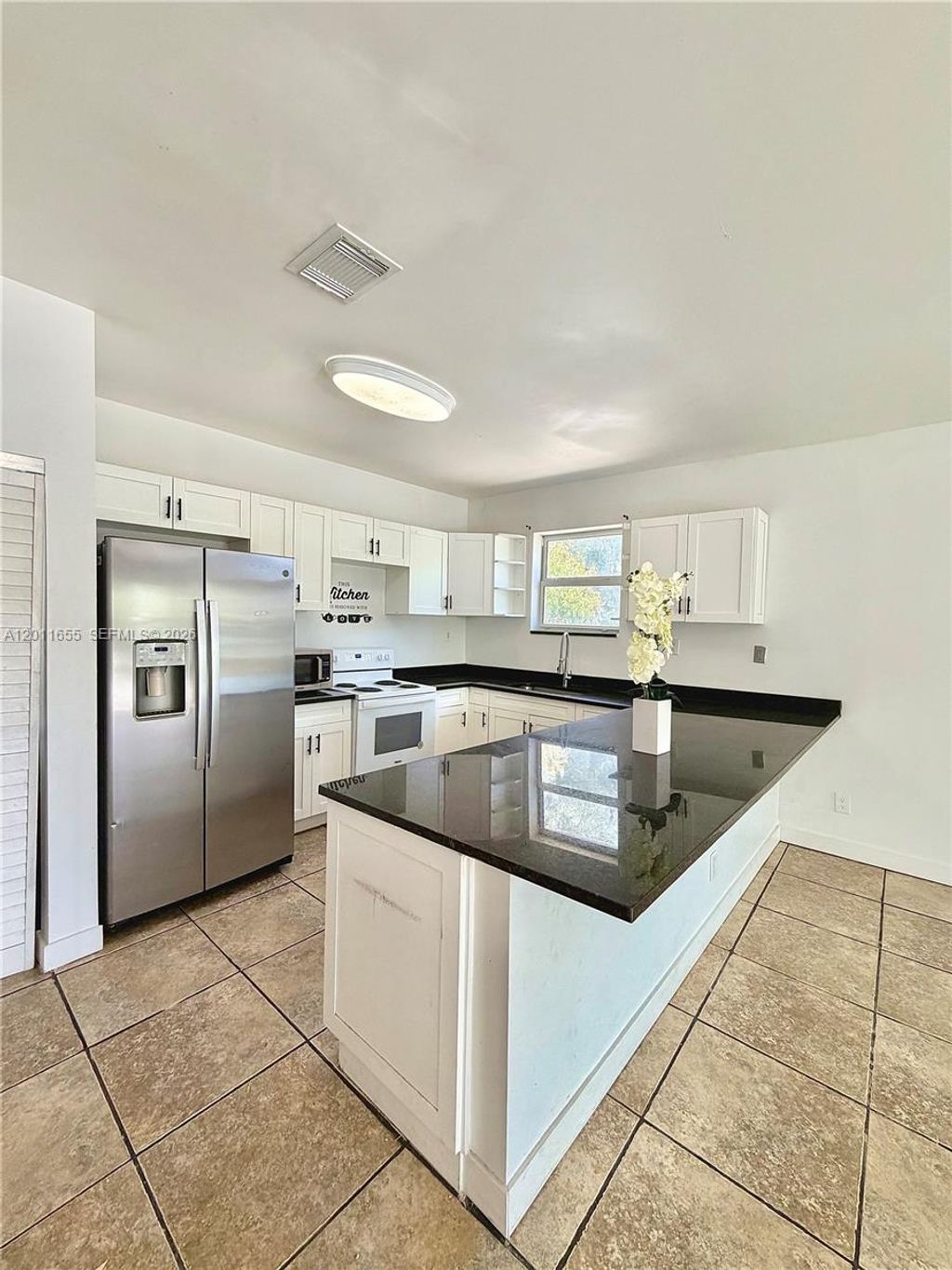 Photo of 1201 NE 6th Ave #1201, Fort Lauderdale, FL 33304 (MLS # A12011655)