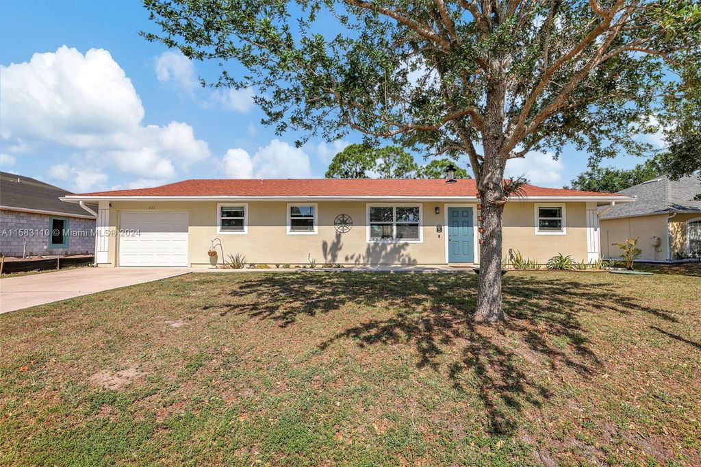 Photo of 431 SW Peach St, Port Saint Lucie, FL 34983 (MLS # A11583110)