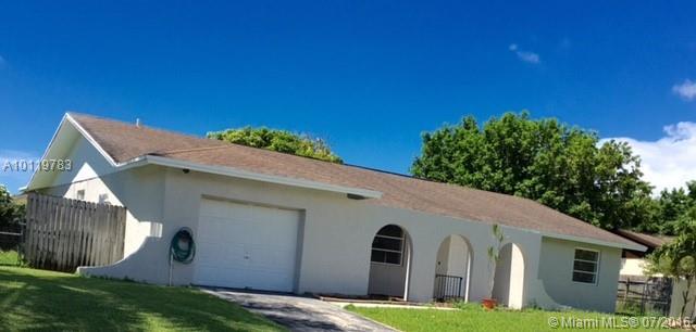 Spacious ranch style family home, 4 /2 near schools, hoses of worship, major streets & highways. Home boasts of a large open kitchen with plenty of cabinets & room for counter seating, 2 pantries & ALL NEW APPLIANCES including a wine cooler. Oversized bedrooms, master has walk in & sliding closets. LOTS OF STORAGE SPACE throughout home. 1 car garage w/ washer/dryer & add'l storage. Large covered wood/concrete patio, huge fenced backyard, mango tree w/ tree house. If you hurry, this house can be YOUR HOME.