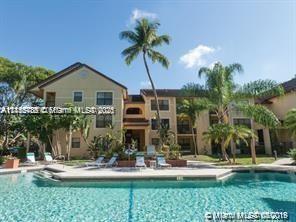 Beautiful unit all redone. 2 bedroom 2 full bathroom, WASHER AND DRYER INSIDE THE UNIT, FANTASTIC LAYOUT. New tile flooring throughout. Renovated bathrooms. washer and dryer. parking space assigned. new ac unit, great patio, Located in a Gated community with patrol 24/7 with lots of amenities, pool area, hot-spa, 2 tennis courts, clubhouse, and jogging trail. The complex is keeping very clean and landscaping is always done. EZ to show.