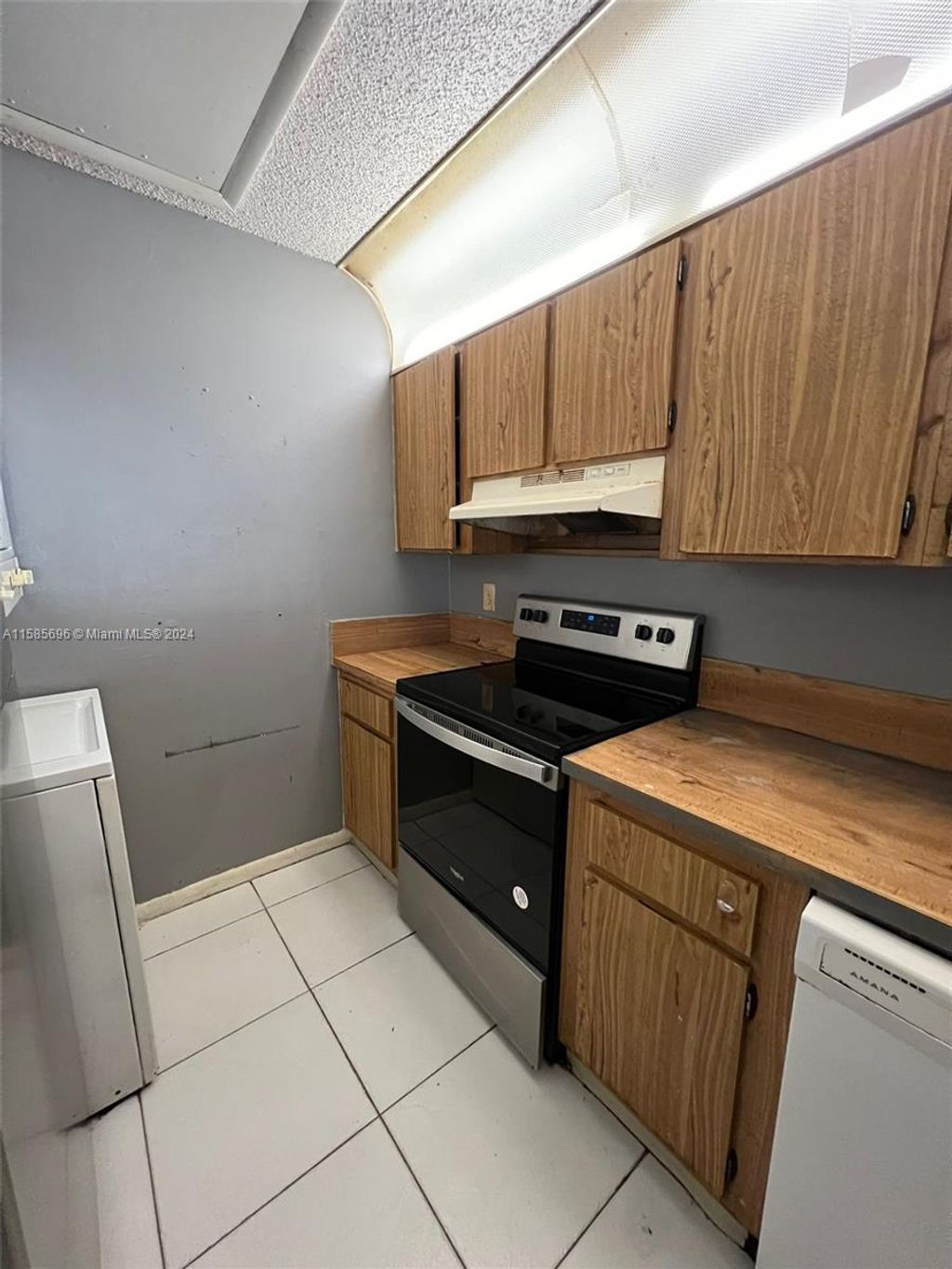 Photo of 821 Twin Lakes Dr #31-H, Coral Springs, FL 33071 (MLS # A11585696)