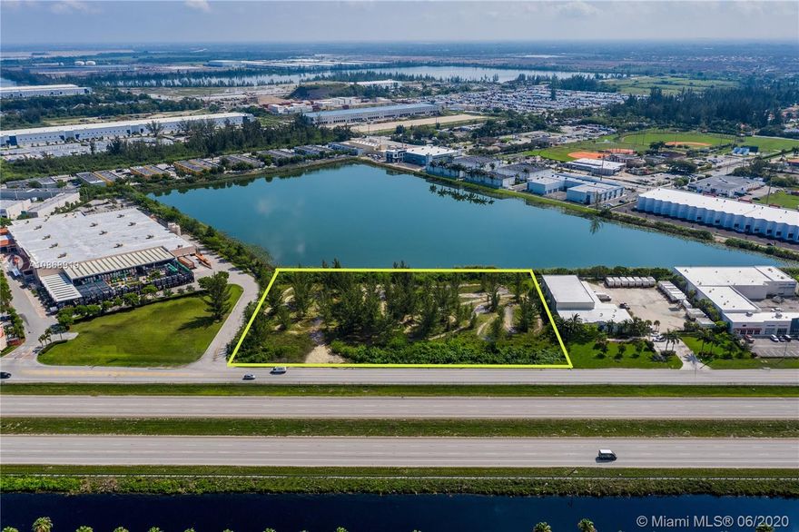 Introducing a uniquely-positioned shovel-ready Hialeah Gardens retail development site. Approved plans for the 3.67 acres of land call for 39,500 SF of building area featuring a 25 bay, L-shaped retail plaza, with 200 parking spaces fronting Okeechobee Rd, w/ average daily drivers over 40,000 vehicles. 

The site sits on a 22-acre manmade lake & is adjacent to a major Home Depot, with a Wawa coming one folio over. Other neighboring lakefront properties include newly constructed retail centers, office & industrial parks, plus a Blue Bell Creameries office & warehouse compound directly to the East. The wide range of allowable from warehouse/self-storage to restaurant, to hotel, to retail make for ample opportunity. Site also features private side road for easy ingress/egress of property.