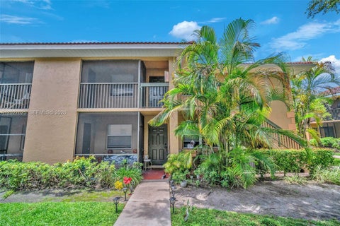 Photo of 767 NW 104th Ave #203, Pembroke Pines, FL 33026 (MLS # A12027625)