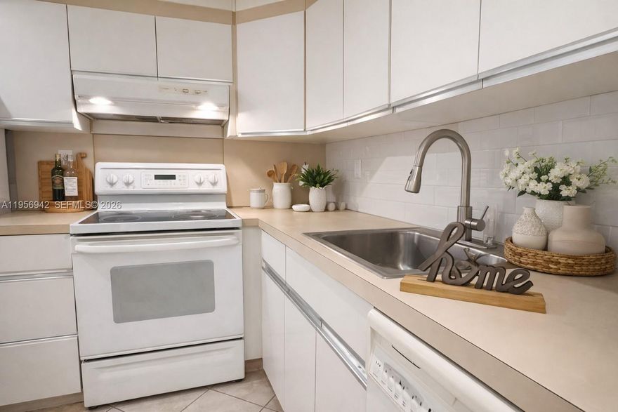 WOW! WHAT AN OPPORTUNITY — PRICED TO SELL! Spacious 3-bedroom, 2.5-bath apartment featuring a private terrace with lush green palm views. Unit offers neutral laminate flooring throughout. Washer/Dryer hookup inside (appliances not included). Assigned parking space C35. Association requires 20% down with offer, minimum 710 credit score, $45,000 annual income, and 6 months of maintenance held in escrow. This 55+ community includes water, cable TV, internet, pest control, building insurance, 24-hour staffed gatehouse, tennis and pickleball courts, and more. On LBX — easy to show!