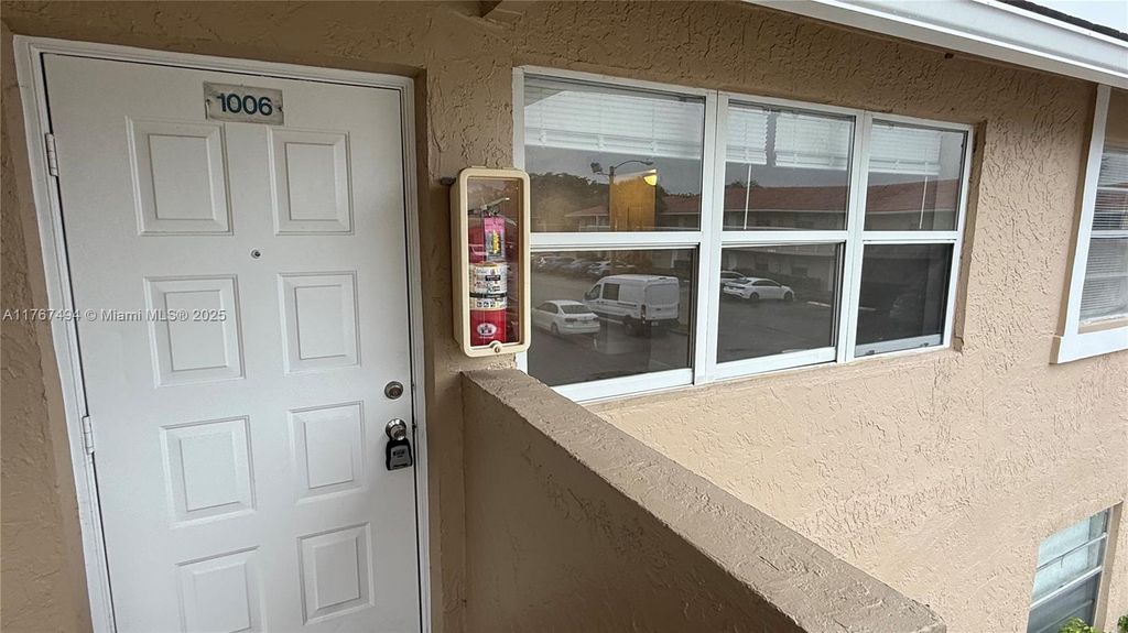 Photo of 1006 Twin Lakes Dr #20-E, Coral Springs, FL 33071 (MLS # A11767494)