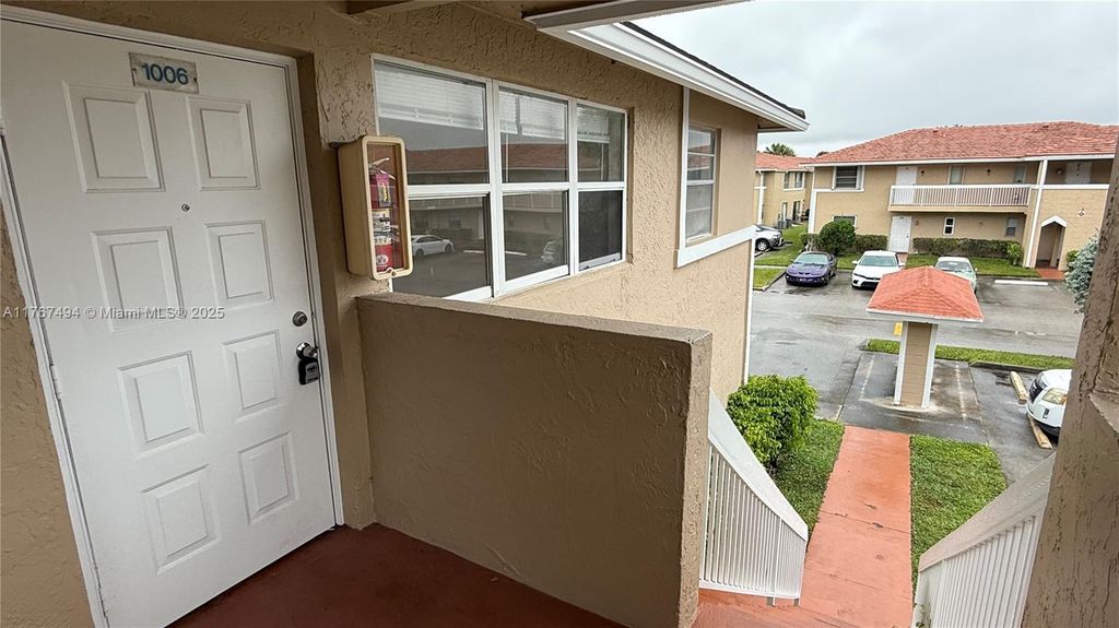 Photo of 1006 Twin Lakes Dr #20-E, Coral Springs, FL 33071 (MLS # A11767494)