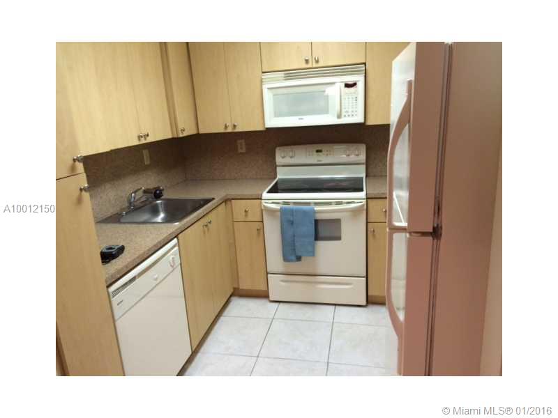 Very nice unit at the Breezes with lake view, 1/1, washer and dryer and laminate wood floors. ON LBX