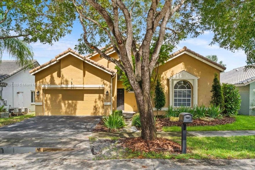 Tucked within the tree-lined streets of Rock Creek, this 3BR/2BA single-story pool home blends comfort & lifestyle. The open interior is filled with natural light and vaulted ceilings. The spacious primary suite features an updated cabana bath. The backyard is built for entertaining with freeform pool, spa, covered patio & fire pit. Additional features include a laundry room, impact protection with a mix of windows and shutters, plus updates: 2023 flat roof, 2020 AC & 2021 water heater. Rock Creek offers 2.75 miles of walking/jogging paths, lakes, parks, playgrounds, sports courts, and a pool/tennis center with 8 tennis courts, basketball, fitness facilities & more—all within Cooper City schools.
