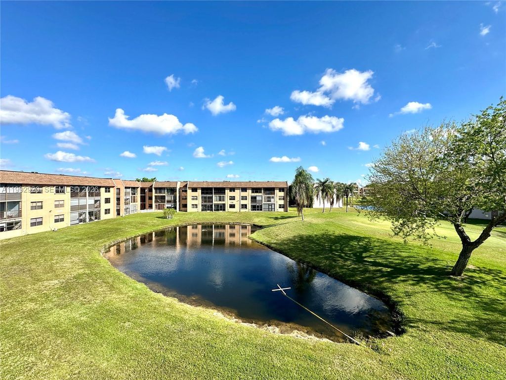 Photo of 10360 NW 30th Ct #303, Sunrise, FL 33322 (MLS # A11992920)