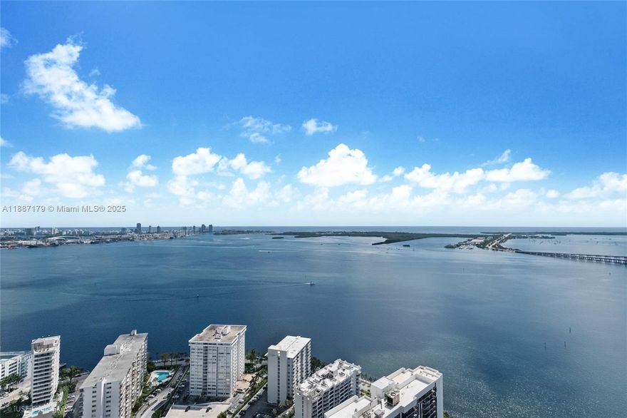 Experience breathtaking water and skyline views from every angle in this TURNKEY 3 bed / 3.5 bath residence at the prestigious boutique building, Echo Brickell. Perched on a high floor, the home features floor-to-ceiling impact windows, filling the interiors with natural light and panoramic views. An open floor plan seamlessly connects the spacious living and dining areas to a gourmet kitchen outfitted with Wolf appliances, sleek cabinetry, and marble countertops. Marble flooring throughout enhances the clean, modern design. Residents enjoy resort-style amenities, including a fitness center, infinity-edge pool with full food and beverage service, 24-hour concierge, and valet. Perfectly positioned in the heart of Brickell, this residence embodies luxury urban living at its finest.