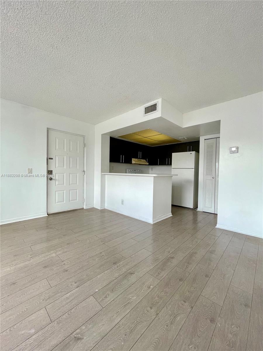 Spacious 1 bedroom, 1 bathroom apartment with 728 sq. ft. of living space and a private balcony, located in a highly desirable West Palm Beach community. This unit is less than a mile from the Palm Beach Outlets and offers direct access to the biking/walking path along Clear Lake, leading straight to Downtown CityPlace and Clematis Street. The community is well-maintained and conveniently located near shopping, dining, and major highways.