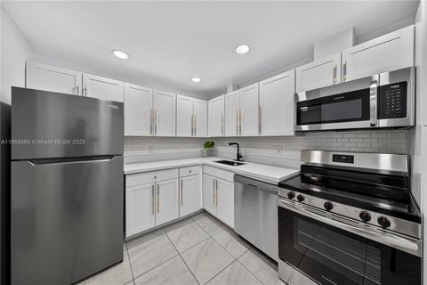 Photo of 3001 S Course Dr #105, Pompano Beach, FL 33069 (MLS # A11865693)