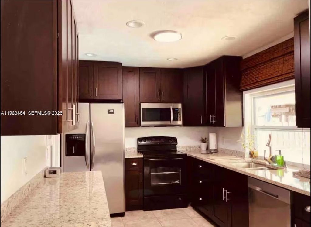 Photo of 9321 NW 14th St, Pembroke Pines, FL 33024 (MLS # A11989484)