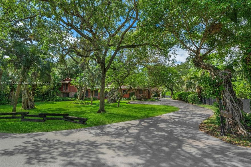 Nestled in the gated community of Hammock Lakes, this spacious home offers privacy amid mature oaks and lush landscaping. Set on a generous 40,946 sq ft lot, it’s a rare opportunity to remodel or build your dream estate. Ideally located near top-rated schools, upscale shopping, dining, and entertainment.