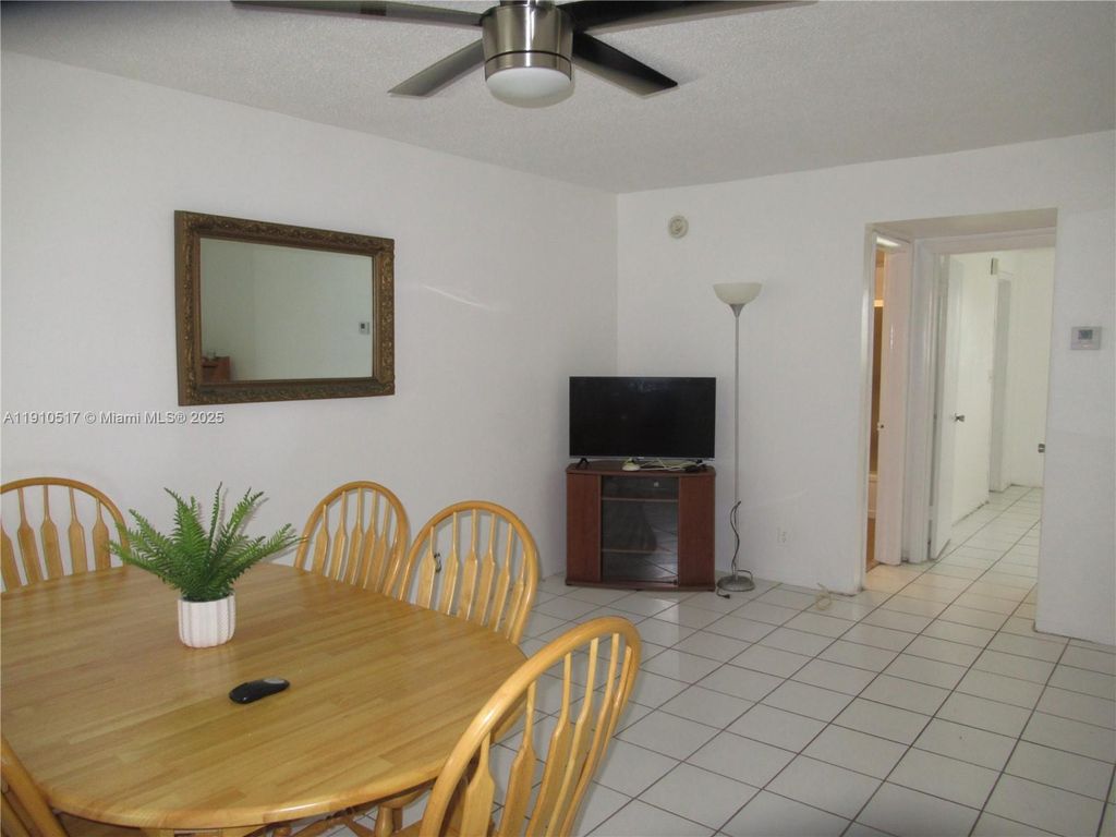 Photo of 581 Blue Heron Dr #309-B, Hallandale Beach, FL 33009 (MLS # A11910517)