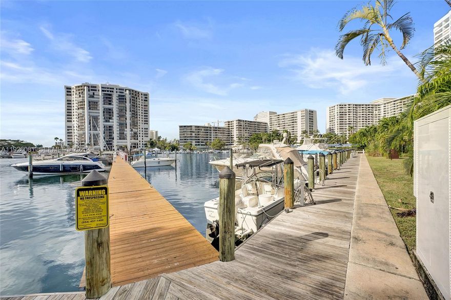 Charming private 3bed / 2 bath villa featuring hardwood flooring throughout. The residence offers a fully renovated eat-in kitchen with stainless steel appliances, solid-surface countertops, and custom wood cabinetry. The open, light-filled floor plan includes a split-bedroom layout for added privacy. The primary suite boasts an expansive walk-in closet, three additional closets, and an updated en-suite bath. The hall bathroom has also been tastefully updated. Additional upgrades include new sliding glass doors, hurricane shutters, a new air-conditioning system, and a new roof. Enjoy outdoor living on the private paver patio. 2 parking spaces. The community is beautifully maintained with manicured grounds, a swimming pool, tennis courts, and a marina. Boat slip available for rent. Ideally located near beaches and casinos.