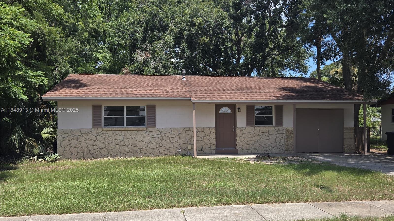 Great starter Home or Investment – Walk to Elementary School! Updated 3-bed, 2-bath block home on a spacious, fenced lot with mature trees. Enjoy a brand-new kitchen with stainless appliances, granite counters, and shaker cabinets. Tile floors in main areas, LVP in laundry. Bathrooms updated, including tiled tub/shower combo and hallway half bath. Features include fresh paint, ceiling fans, lots of natural light, and a dedicated laundry room. Located in a quiet neighborhood within walking distance of the elementary school—perfect for families or downsizers. Move-in ready—schedule your tour today!