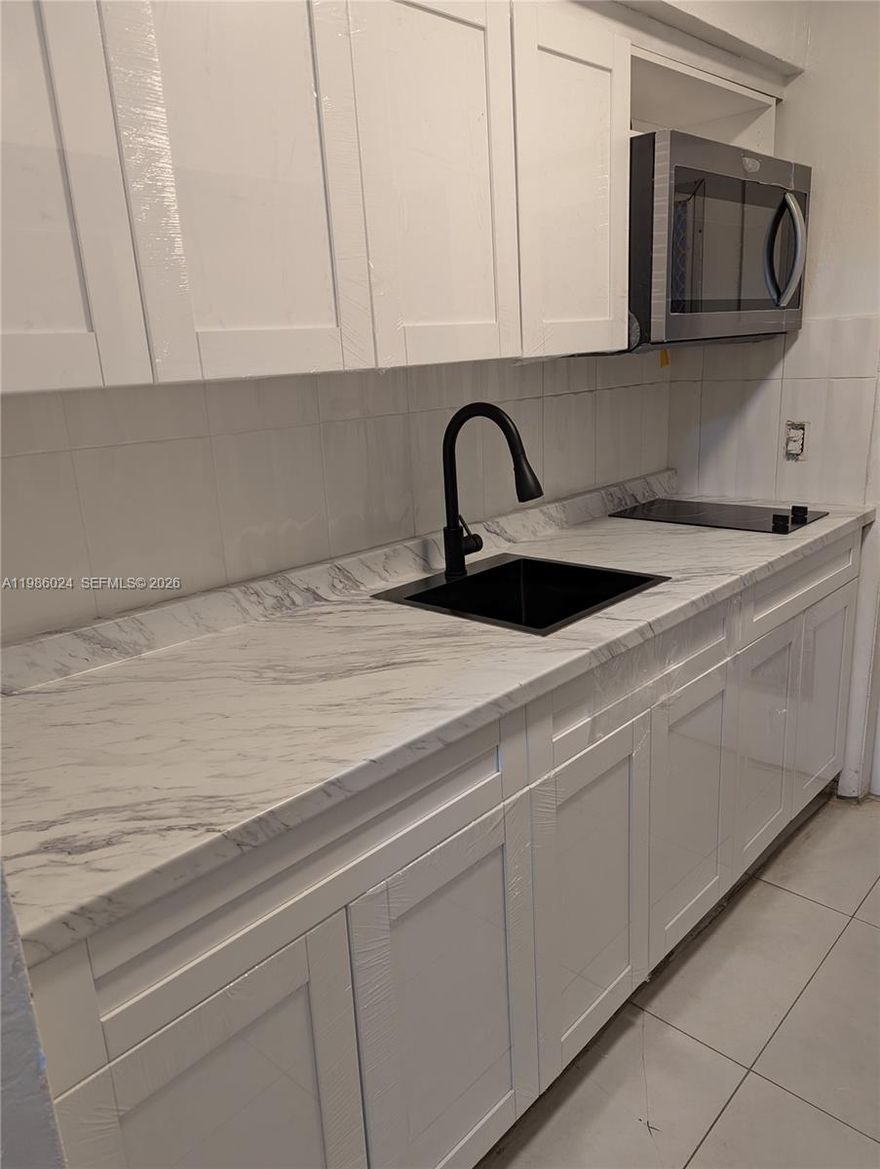 Charming Beachside Apartment! Brand new kitchen, upgraded bathroom, just painted, possible fully furnished $150 extra charge. Just 2 blocks from the beach, this studio offers the perfect blend of comfort, convenience, and coastal living. Nestled in a small, well-kept building with a welcoming community, this unit is ideal for anyone looking to enjoy the beach lifestyle year-round or as a vacation getaway. Move right in! Bright and airy layout. Steps from shops, cafes, and the ocean as a huge pool. Don't miss this rare opportunity to live near the beach in a home that’s full of charm and ready to enjoy from day one!