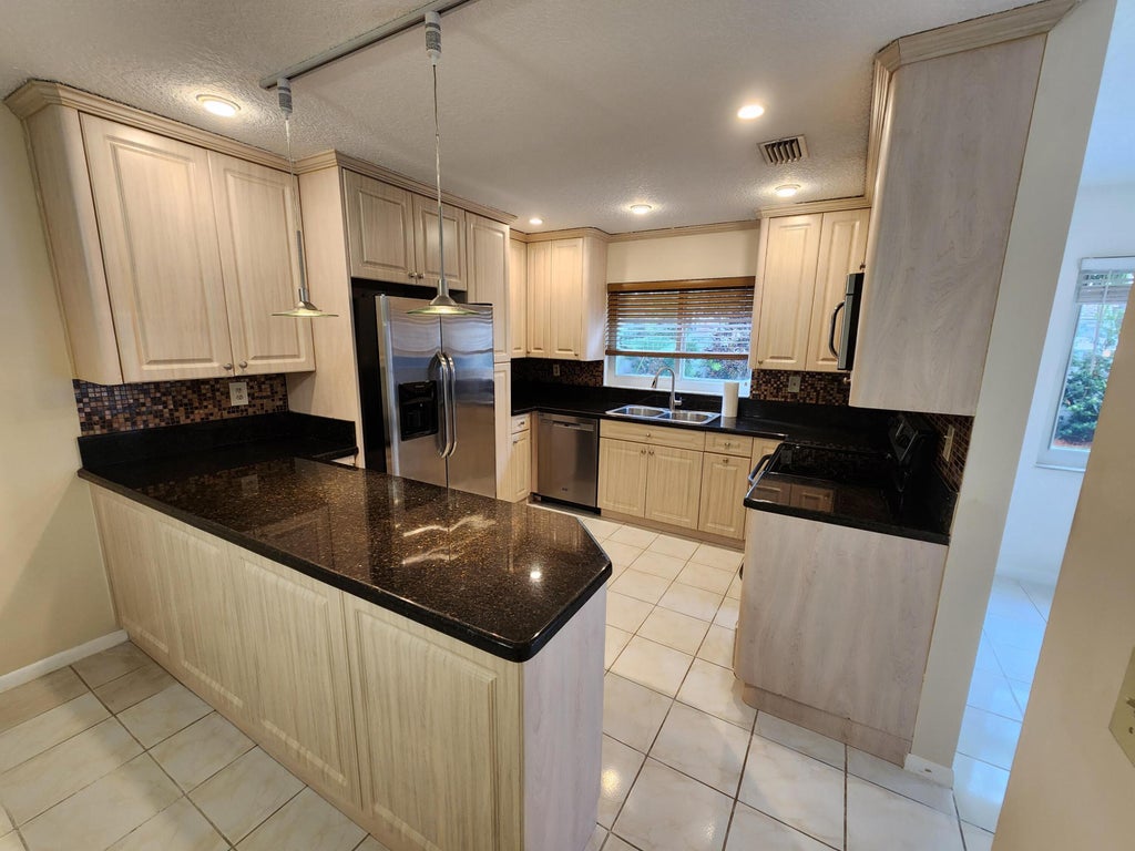 Photo of 9812 NW 2nd Court, Plantation, FL 33324 (MLS # B26038599)