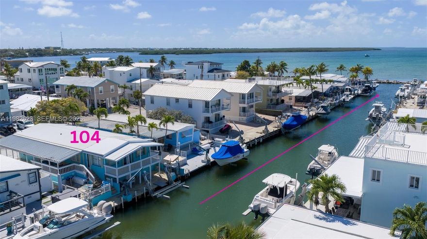 Discover this spacious 3-bedroom, 2-bath waterfront mobile home offering 1,464 sq. ft. of living space in the desirable Sunset Acres community. Built in 1983, the home qualifies for financing and presents an excellent opportunity to enjoy the relaxed Florida Keys lifestyle today while planning for the future. Inside, the open layout provides comfortable space for family and guests. Downstairs, storage room offers flexible space perfect for a hobby area, kids' hangout, or convenient storage for fishing gear, paddleboards, and all your water toys. Boaters will appreciate the 40-foot dock with 15,000-pound boat lift and immediate bay access just minutes away. Cruise easily to the ocean through Tavernier Creek or spend the evening unwinding on the new waterfront deck, the ideal spot to relax and take in beautiful Keys sunsets. Located in a quiet, welcoming neighborhood close to shopping, restaurants, and medical facilities--and within comfortable reach of Miami--this property offers both convenience and island charm. Whether you're looking for an affordable waterfront home, a boater's retreat, or a future redevelopment opportunity for a new single-family home, this property offers exceptional potential in a prime Keys location.