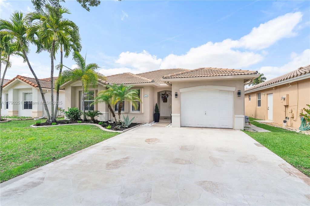 Photo of 13995 S Cypress Cove Cir, Davie, FL 33325 (MLS # A11790251)