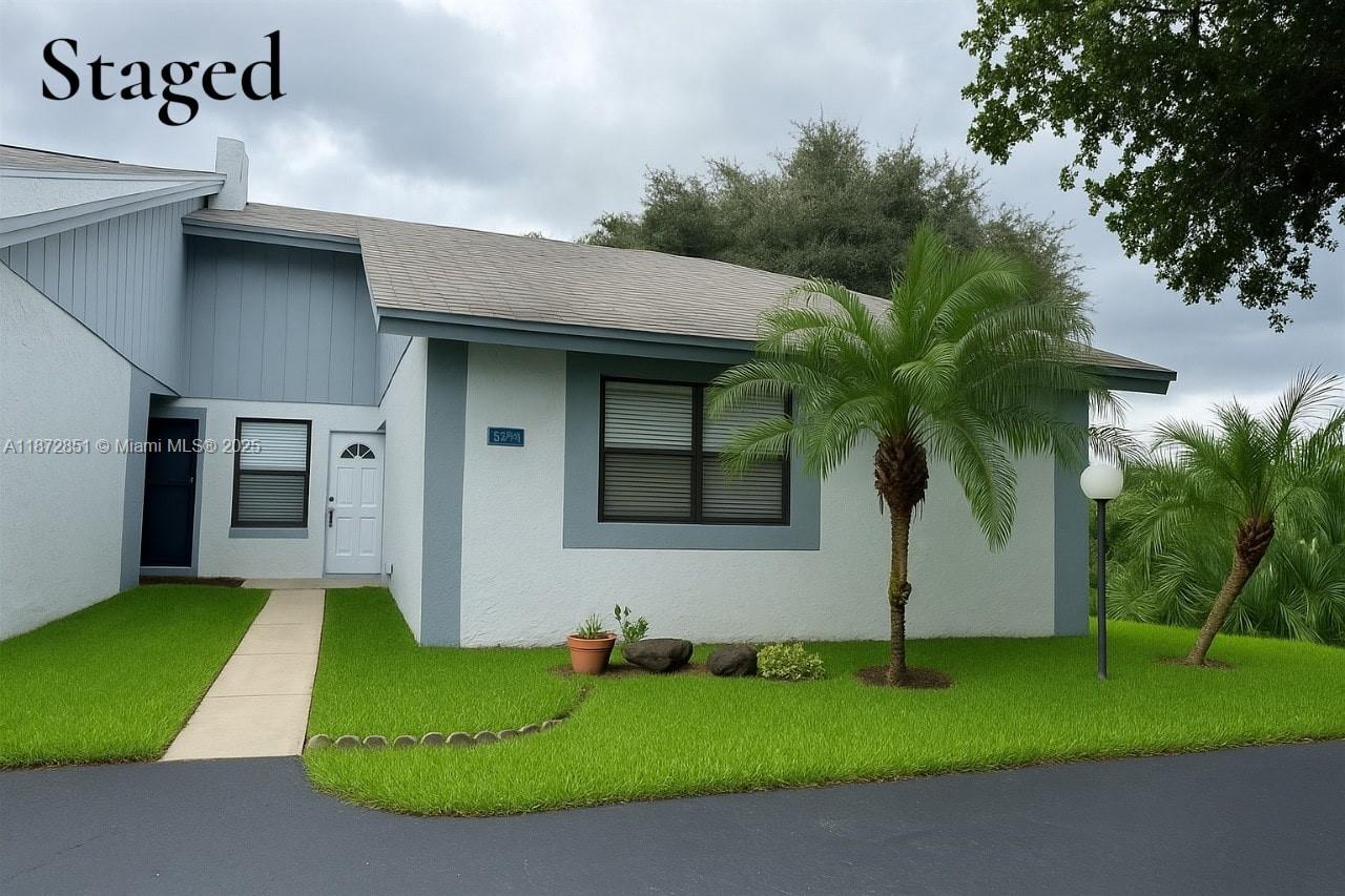 Charming and move-in ready townhouse with 2 bedrooms and 2 bathrooms. The updated kitchen features granite countertops and stainless steel appliances. Washer and dryer inside the unit for your convenience. Relax or entertain in the private fenced patio. Low condo fee makes this property an excellent investment or perfect starter home!
